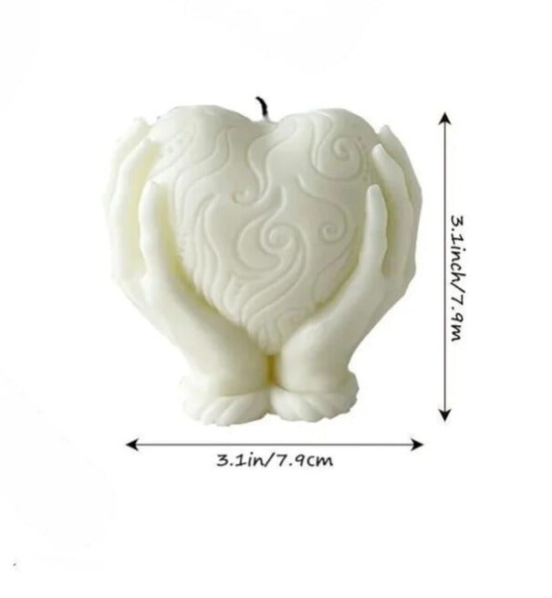 Heart holding candle