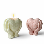 Heart holding candle