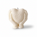 Heart holding candle