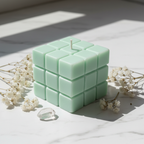 Pastel mint green dice candle on white marble - Just Natural Purity