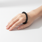 Model wearing Black Obsidian bead bracelet — premium crystal bracelet for protection and grounding