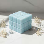 Pastel sky blue dice candle on white marble - Just Natural Purity