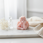 Blush pink angel cherub figurine candle styled on white marble with dried flowers and crystal - Just Natural Purity