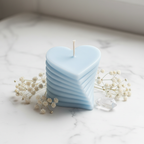 Pastel sky blue layered heart candle on white marble - Just Natural Purity