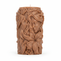Goddess sculptural pillar candle on pure white background showing intricate 3D relief carving detail