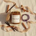 Warm Embrace Set — Warm Vanilla Candle & Amethyst Crystal Band hamper flat lay