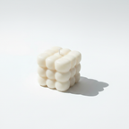 Pillow glow cushion shaped soy candle - white background studio shot - Just Natural Purity