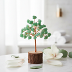 Green Aventurine Crystal Tree on marble with petals, plain wood base