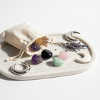 Intuition & Psychic Crystal Set - four crystal tumbles spilling from cream cotton potli with dried lavender