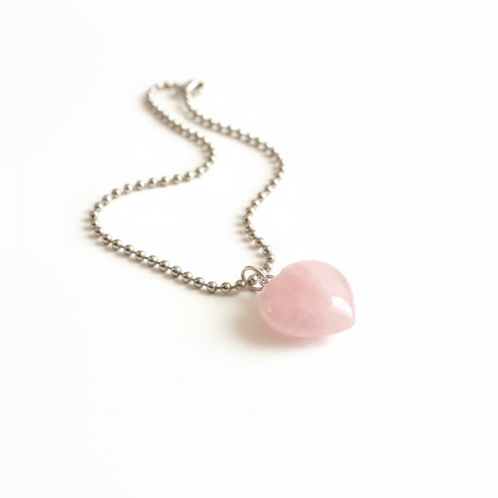 Rose Quartz heart pendant necklace on silver ball chain — clean white background product shot