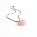 Rose Quartz heart pendant necklace on silver ball chain — clean white background product shot