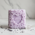 Pastel lavender Love Pillar rose candle on white marble - Just Natural Purity