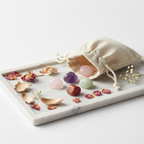 Love & Heart Healing Crystal Set - four crystal tumbles spilling from cream cotton potli with dried rose petals