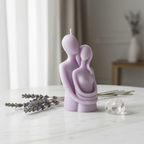 Pastel lavender couple hugging figurine soy candle on white marble with dried lavender - Just Natural Purity