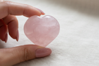 Close-up detail of Rose Quartz Heart showing soft pink translucent appearance