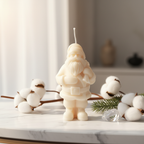 Cream Santa Claus figurine candle festive home decor styled on white marble - Just Natural Purity