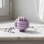 Pastel lavender infinity bloom candle on white marble - Just Natural Purity