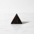 Garnet Pyramid clean side profile on white marble