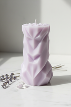 Pastel lavender geometric chevron pillar candle on white marble - Just Natural Purity