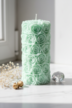 Pastel mint green rose textured pillar soy candle on white marble with dried flowers - Just Natural Purity